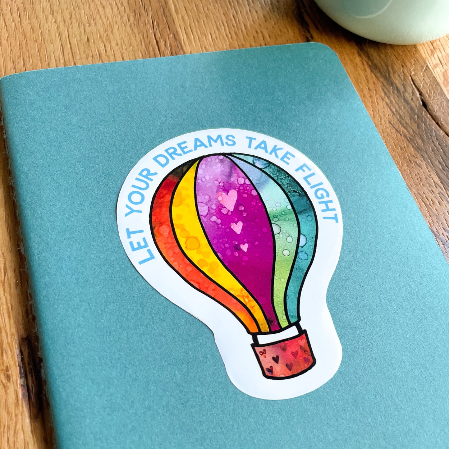 Let your dreams take flight with this vibrant hot air balloon vinyl sticker.