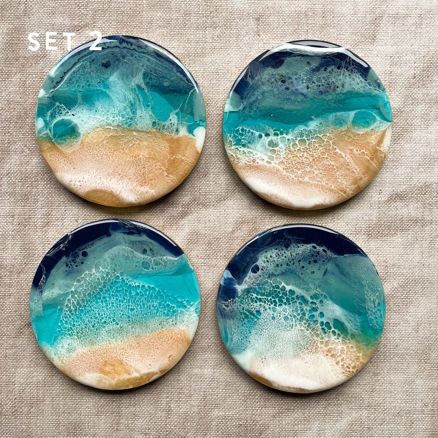 Add a coastal vibe to your home with this set of 4 ocean coasters, ideal for beach house decor.