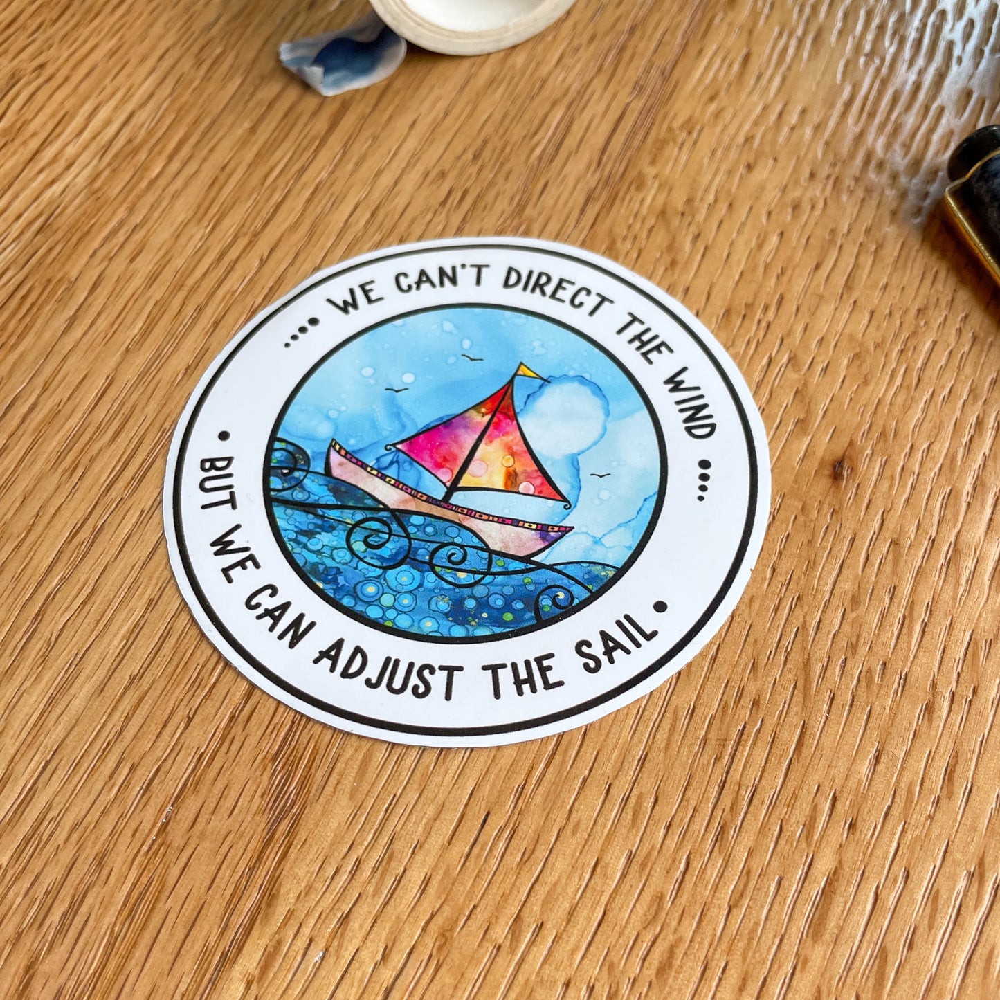 Inspiring vinyl sticker featuring a sailing boat - a constant reminder that you have the power to overcome any obstacle.