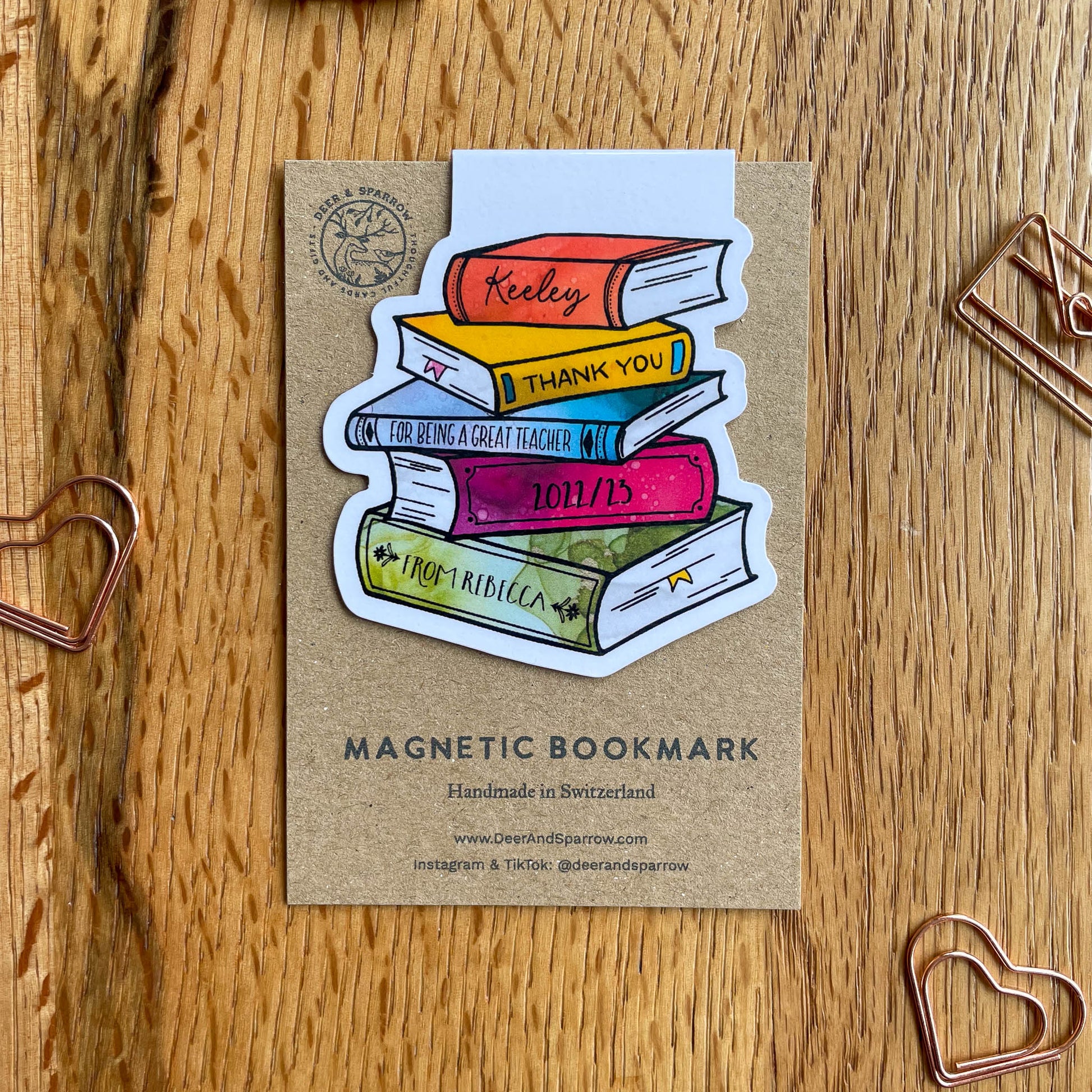 Personalised teacher appreciation gift bookmark featuring a stack of books illustration
