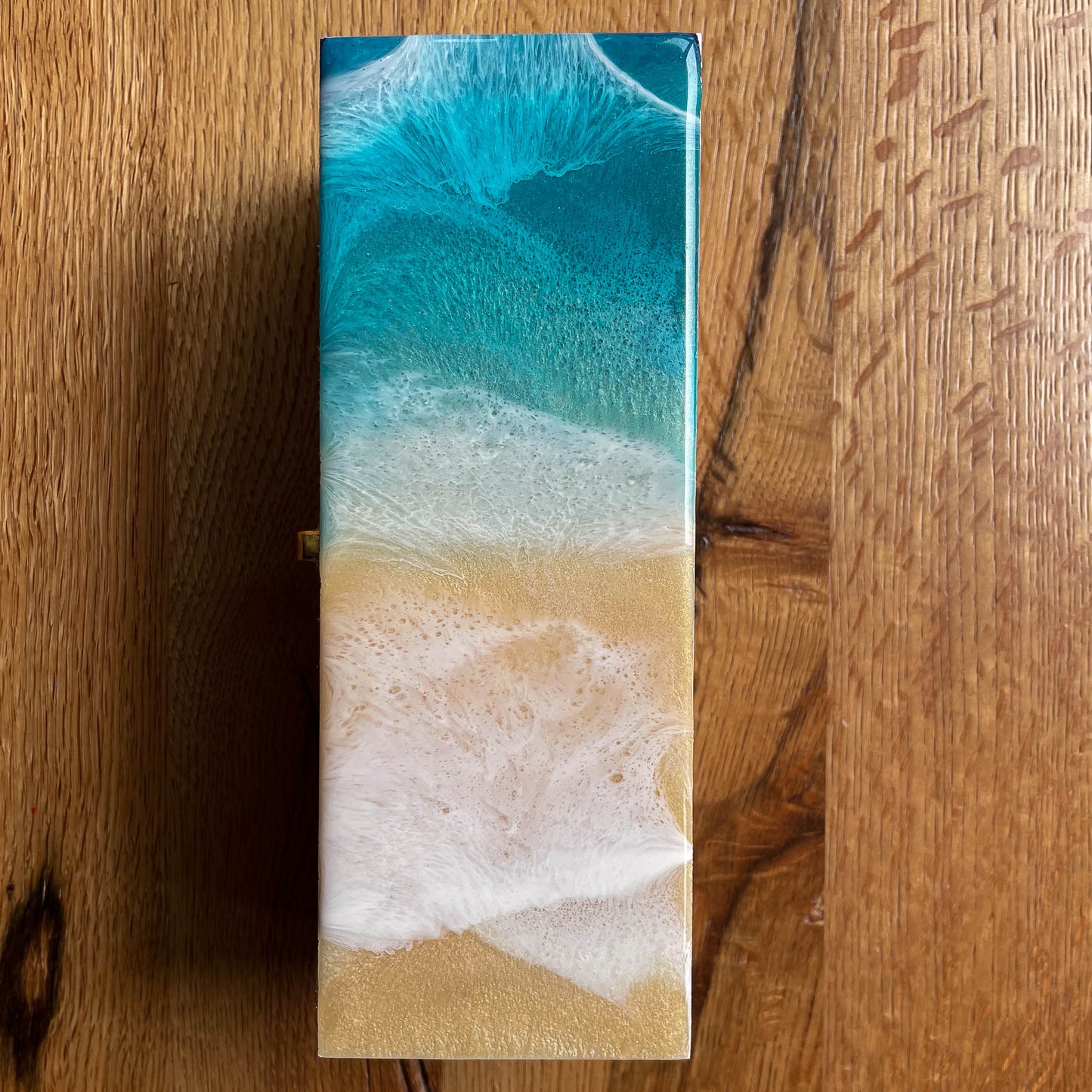 Ocean-themed tea box with epoxy resin-coated lid